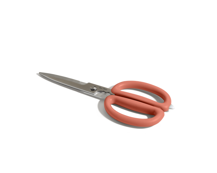 The Shear Genius stainless steel kitchen shears with pink handles and a multifunctional design are displayed on a white background.